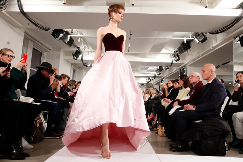 articles/2014/02/13/femininity-on-the-runway-at-oscar-de-la-renta-and-marchesa/140213-odlr-cunningham-tease_sjj7c4