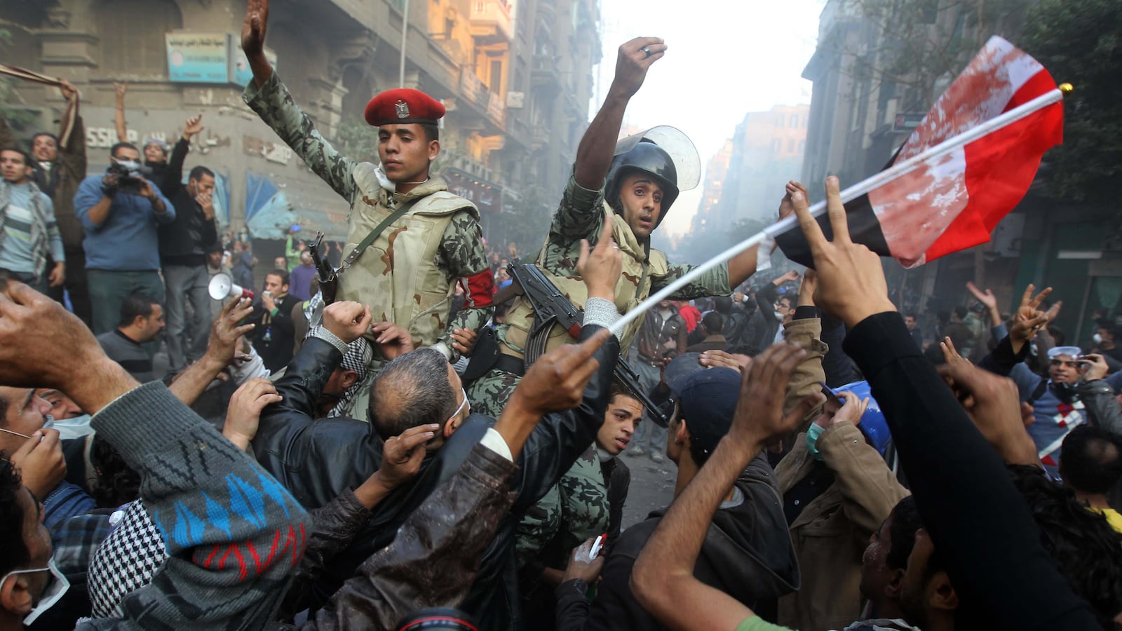 articles/2013/11/16/an-american-in-cairo-to-work-on-his-graphic-novel-tries-to-understand-the-story-of-the-revolution/131115-ide-cairo-tease_lf3fwt