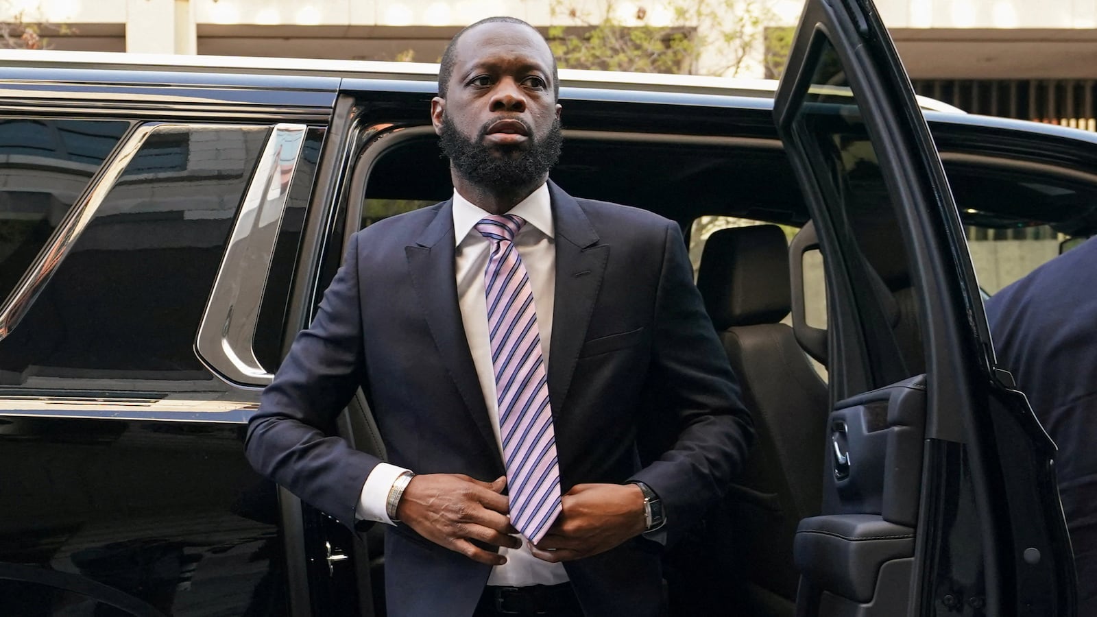 Fugees rapper Prakazrel (Pras) Michel arrives for opening arguments in his trial at U.S. District Court in Washington, U.S., March 30, 2023.