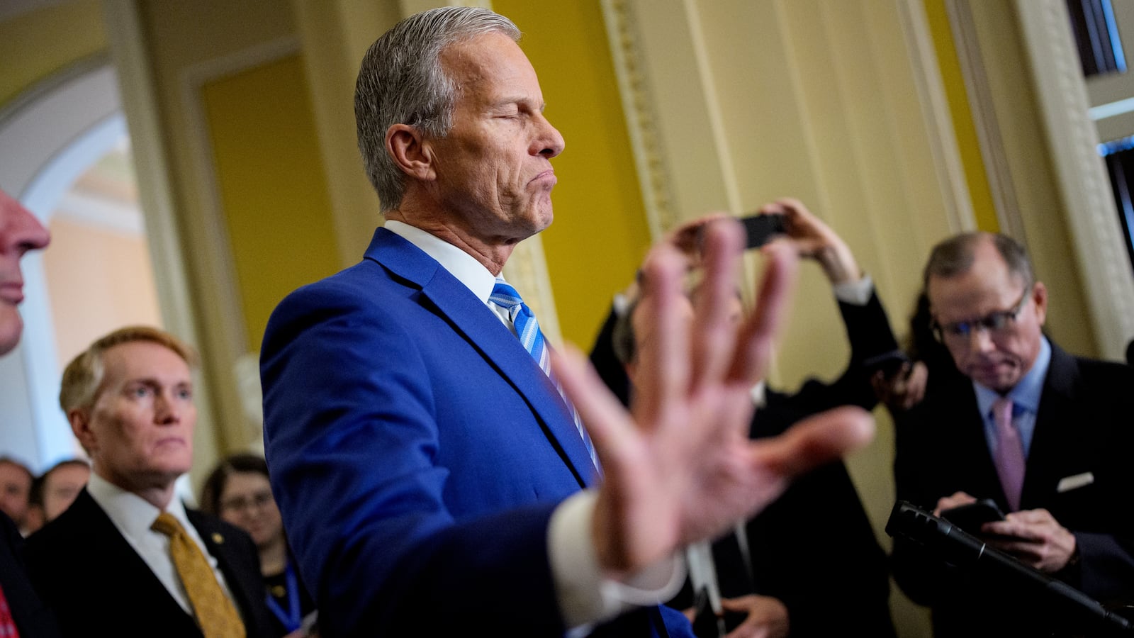 WASHINGTON, DC - OCTOBER 15: Senate Majority Leader John Thune (R-SD) gestures while speaking to reporters following a Republican policy luncheon at the U.S. Capitol Building on October 15, 2025 in Washington, DC. The government remains shut down after Congress failed to reach a funding deal 15 days ago. (Photo by Andrew Harnik/Getty Images)