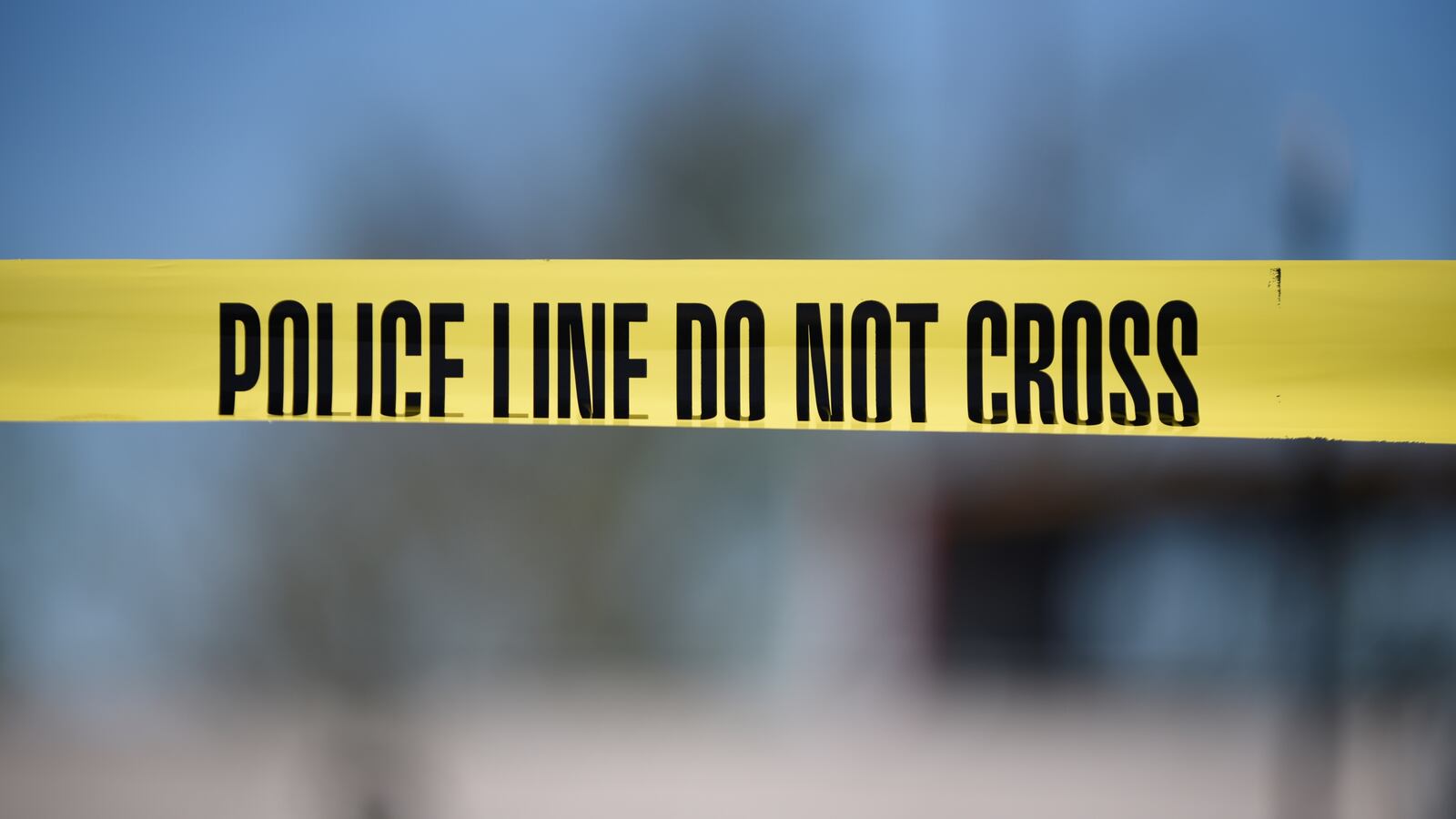 Crime tape says "police line do not cross"