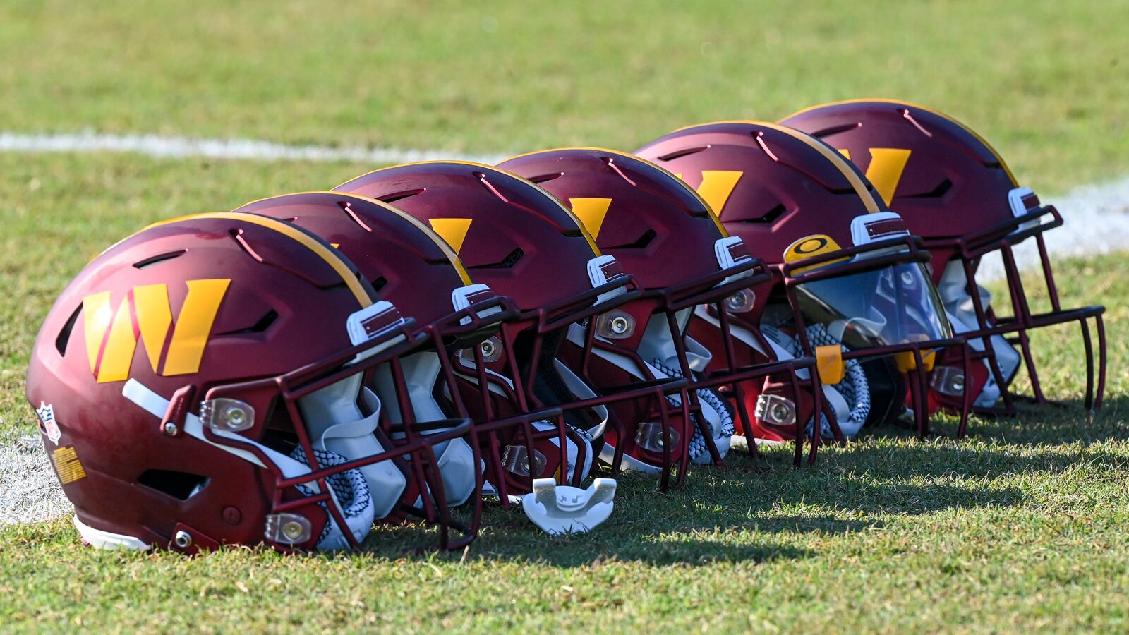 The Washington Commanders new logo on the helmets during OTA On-Field Practice.