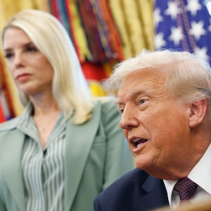 WASHINGTON, DC - SEPTEMBER 15:  U.S. President Donald Trump answers questions from reporters after signing a Presidential Memorandum in the Oval Office on September 15, 2025 in Washington, DC. Trump signed a memorandum that will send members of the National Guard and federal law enforcement agencies to Memphis, Tennessee in an effort to decrease crime in the city. Also pictured is Attorney General Pam Bondi (L).  (Photo by Kevin Dietsch/Getty Images)