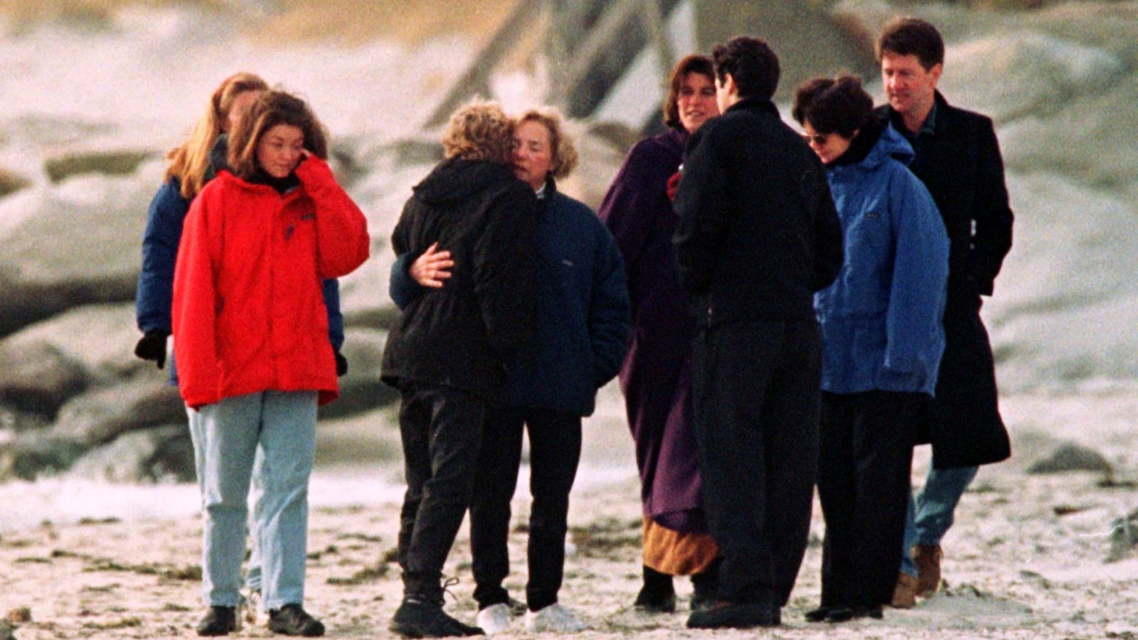 Ethel Kennedy walks with her children on beach.