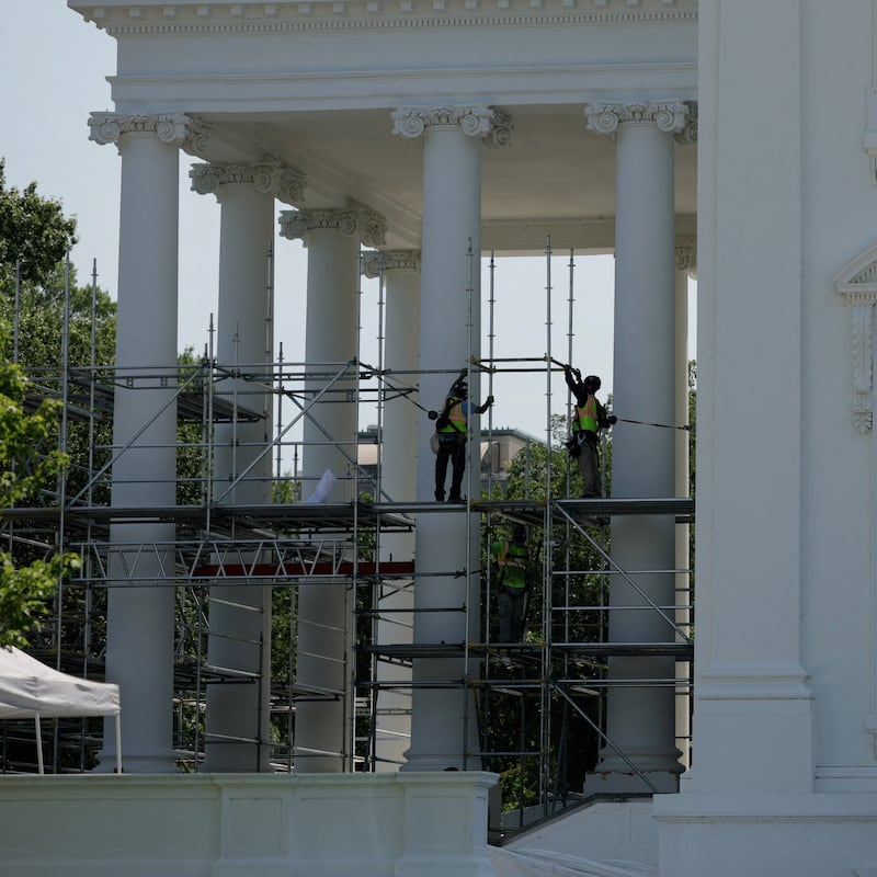 Workers set up scaffolding at the North Portico of the White House in Washington, D.C., U.S., June 30, 2026.