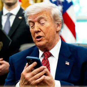 WASHINGTON, DC  May 23, 2025:

US President Donald Trump silenced his cellphone in the Oval Office of the White House on Friday May 23, 2025. The executive orders were related to the nuclear power industry in the US.

(Photo by Demetrius Freeman/The Washington Post via Getty Images)