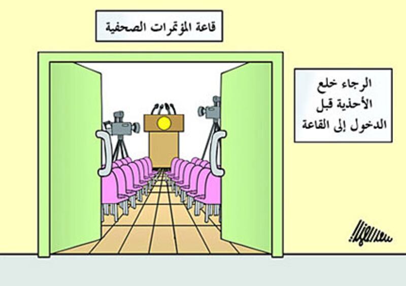 galleries/2008/12/16/throwing-shoes-at-bush/bush-shoe---press_ws8039