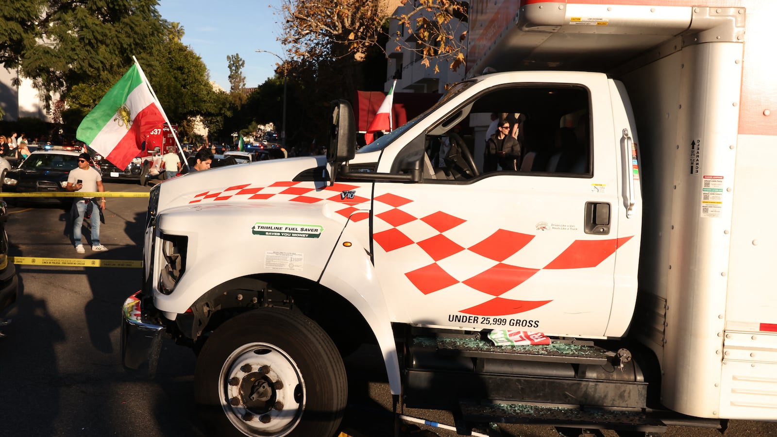 A U-Haul truck that reportedly was driven into a crowd is pictured during a "Free Iran" rally in Los Angeles, California, on January 11, 2026.