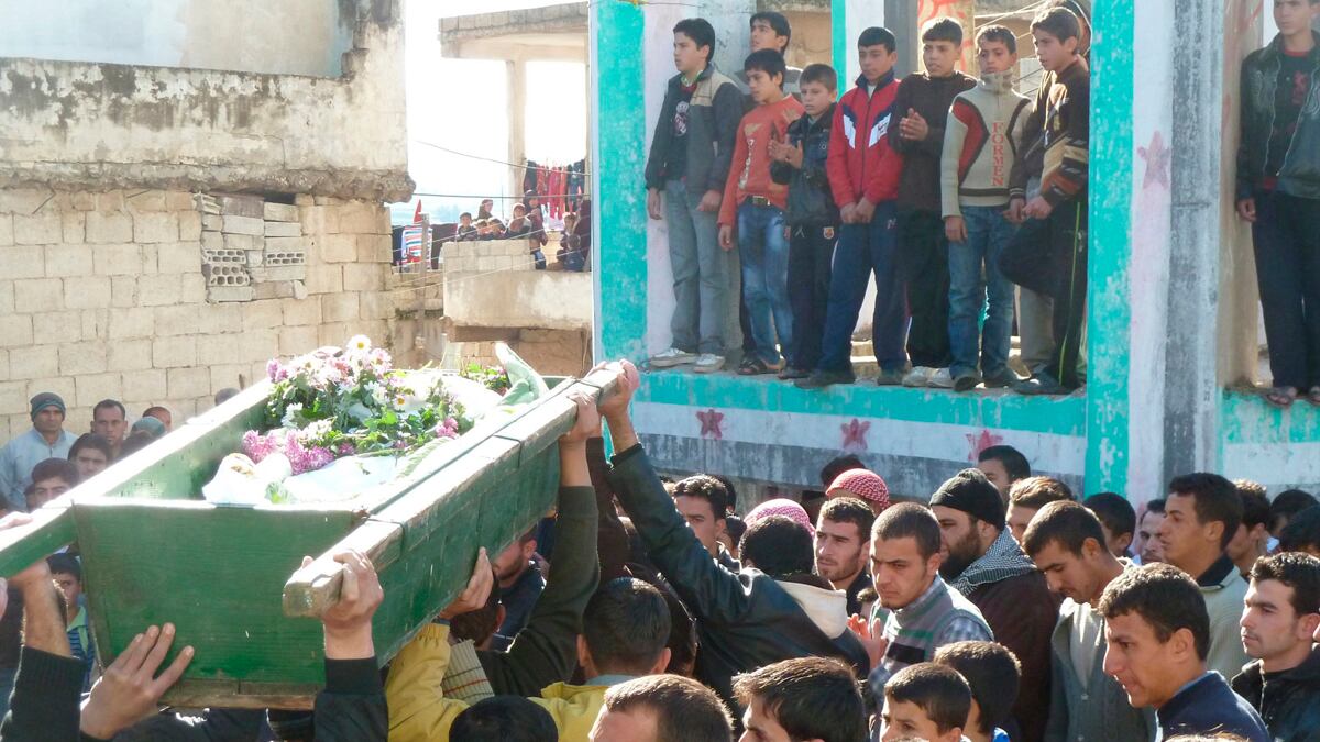 cheats/2011/12/13/syria-death-toll-rises-to-5-000/syria-death-toll-five-thousand-funeral-cheat_ltmz1u