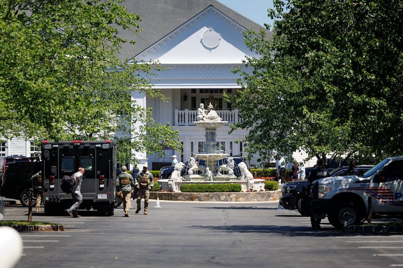LOWES ISLAND, VA - JUNE 13: U.S. Secret Service Hammer Team Agents exit a vehicle outside Trump National Golf Club Washington DC on June 13, 2026 in Lowes Island, Virginia. Trump traveled to his northern Virginia golf club before attending a dinner event later in the evening. (Photo by Tom Brenner/Getty Images)