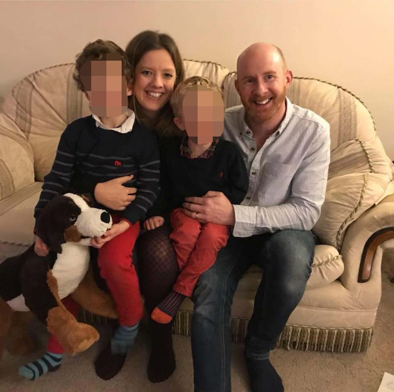 Mark Cain, Hannah Cain, and two of their children.