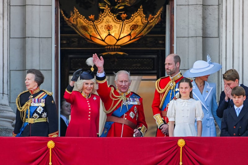 Britain's King Charles, Queen Camilla, Prince William, Kate, Princess of Wales, Prince George, Princess Charlotte, Prince Louis, Anne, Princess Royal, and other officials appear on the balcony of Buckingham Palace during the Trooping the Colour parade to honour Britain's King Charles, as part of the official birthday celebrations, in London, Britain, June 13, 2026. REUTERS/Chris J. Ratcliffe