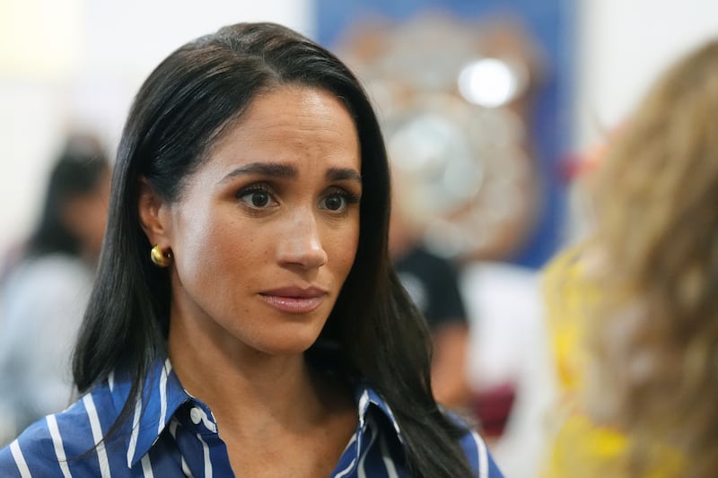 SYDNEY, AUSTRALIA - APRIL 17: Meghan, Duchess of Sussex meets volunteer first responders from Bondi Surf Bathers' Life Saving Club, during a visit to Bondi Beach, on day four of the royal trip to Australia on April 17, 2026 in Sydney, Australia. Volunteers from the organisation, founded in 1907, played an integral role in protecting beachgoers and saving lives during the terrorist attack at Bondi Beach on December 14. (Photo by Jonathan Brady-Pool/Getty Images)