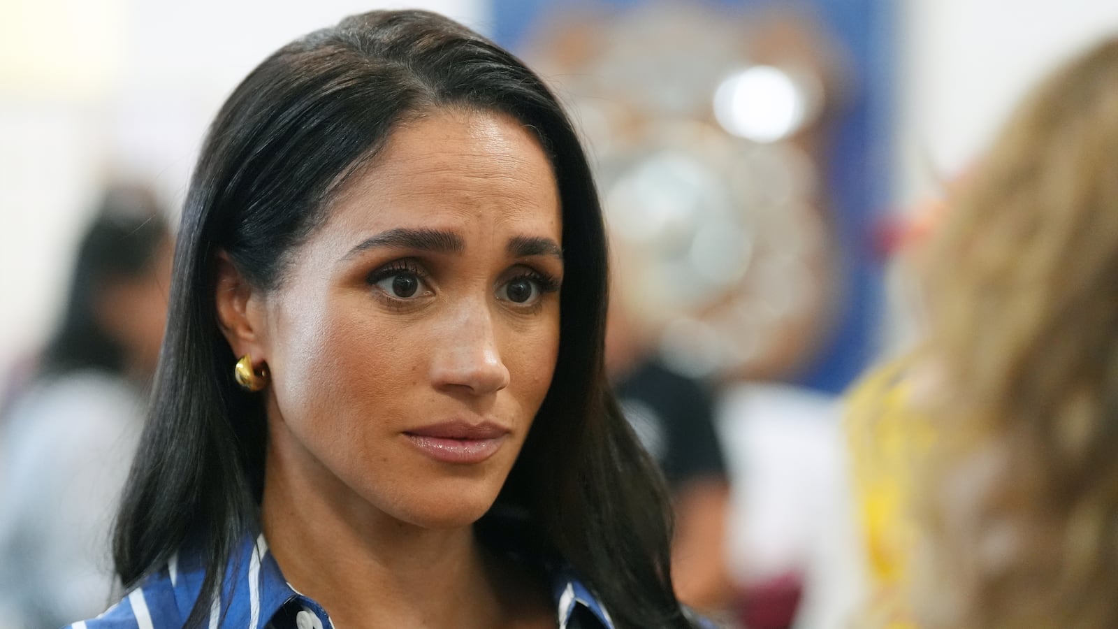 SYDNEY, AUSTRALIA - APRIL 17: Meghan, Duchess of Sussex meets volunteer first responders from Bondi Surf Bathers' Life Saving Club, during a visit to Bondi Beach, on day four of the royal trip to Australia on April 17, 2026 in Sydney, Australia. Volunteers from the organisation, founded in 1907, played an integral role in protecting beachgoers and saving lives during the terrorist attack at Bondi Beach on December 14. (Photo by Jonathan Brady-Pool/Getty Images)