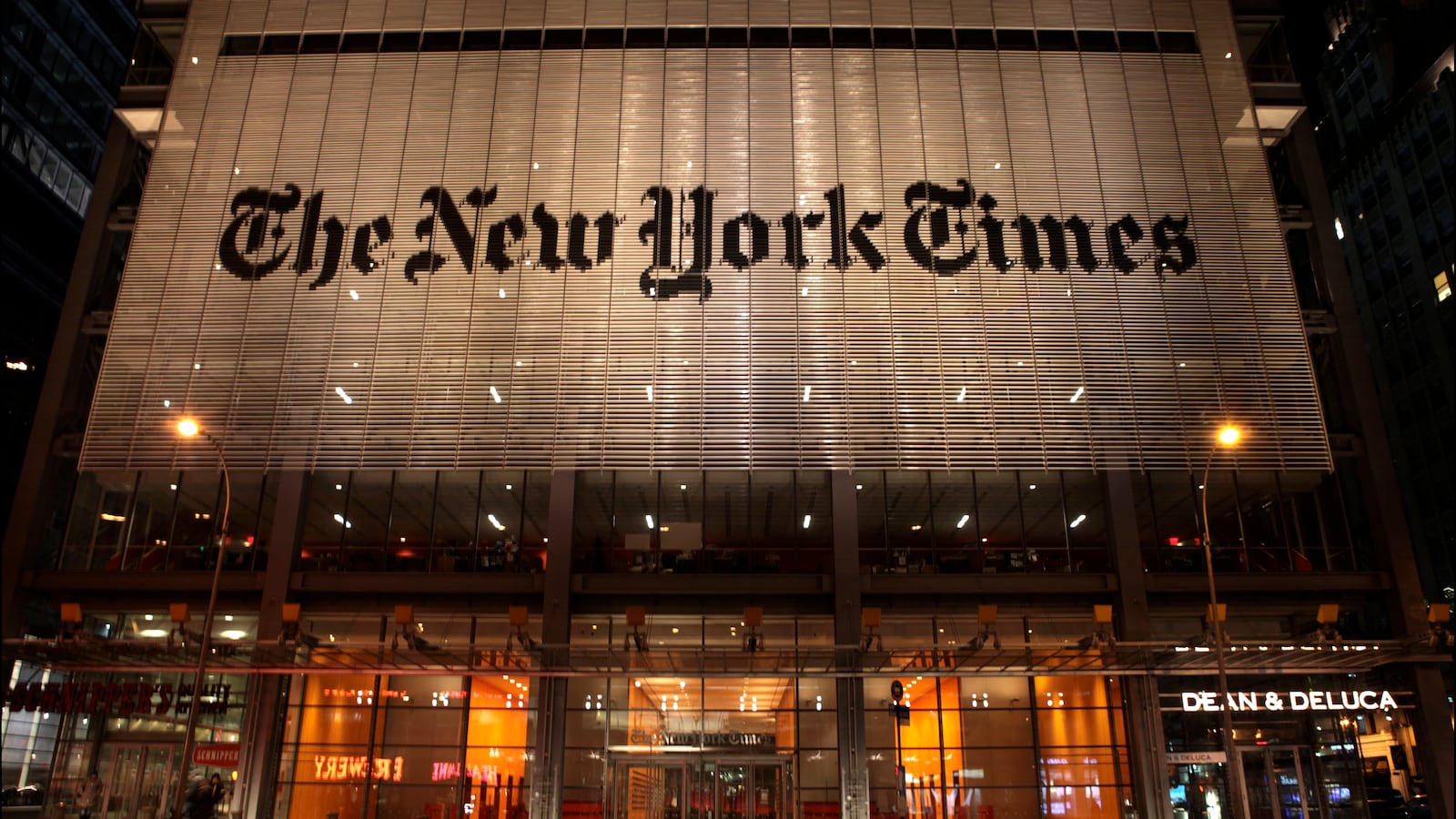 A photo of The New York Times building at night.