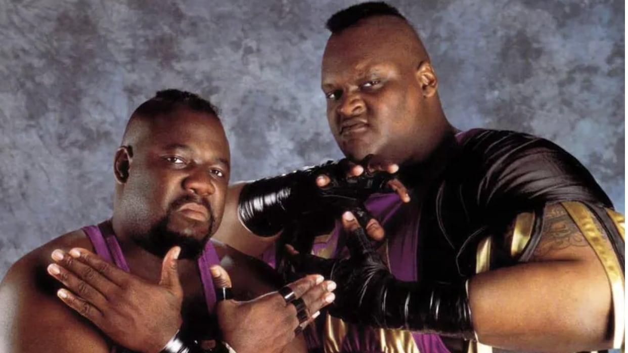 Wrestler Sir Mo, left, with Mabel, has died age 58.