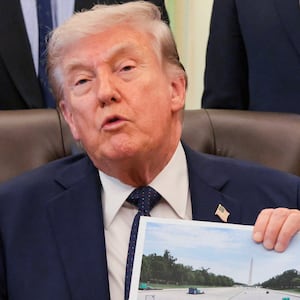 U.S. Secretary of Commerce Howard Lutnick, U.S. Health and Human Services (HHS) Secretary Robert F. Kennedy Jr., Chief Scientific Officer at Regeneron George D. Yancopoulos and Director of the Center for Medicare Chris Klomp listen as U.S. President Donald Trump shows an image and speaks about renovations at the Lincoln Memorial Reflecting Pool during a healthcare affordability event in the Oval Office at