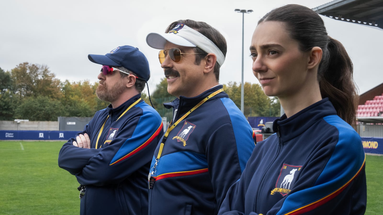 Brendan Hunt, Jason Sudeikis, and Tanya Reynolds in 'Ted Lasso'