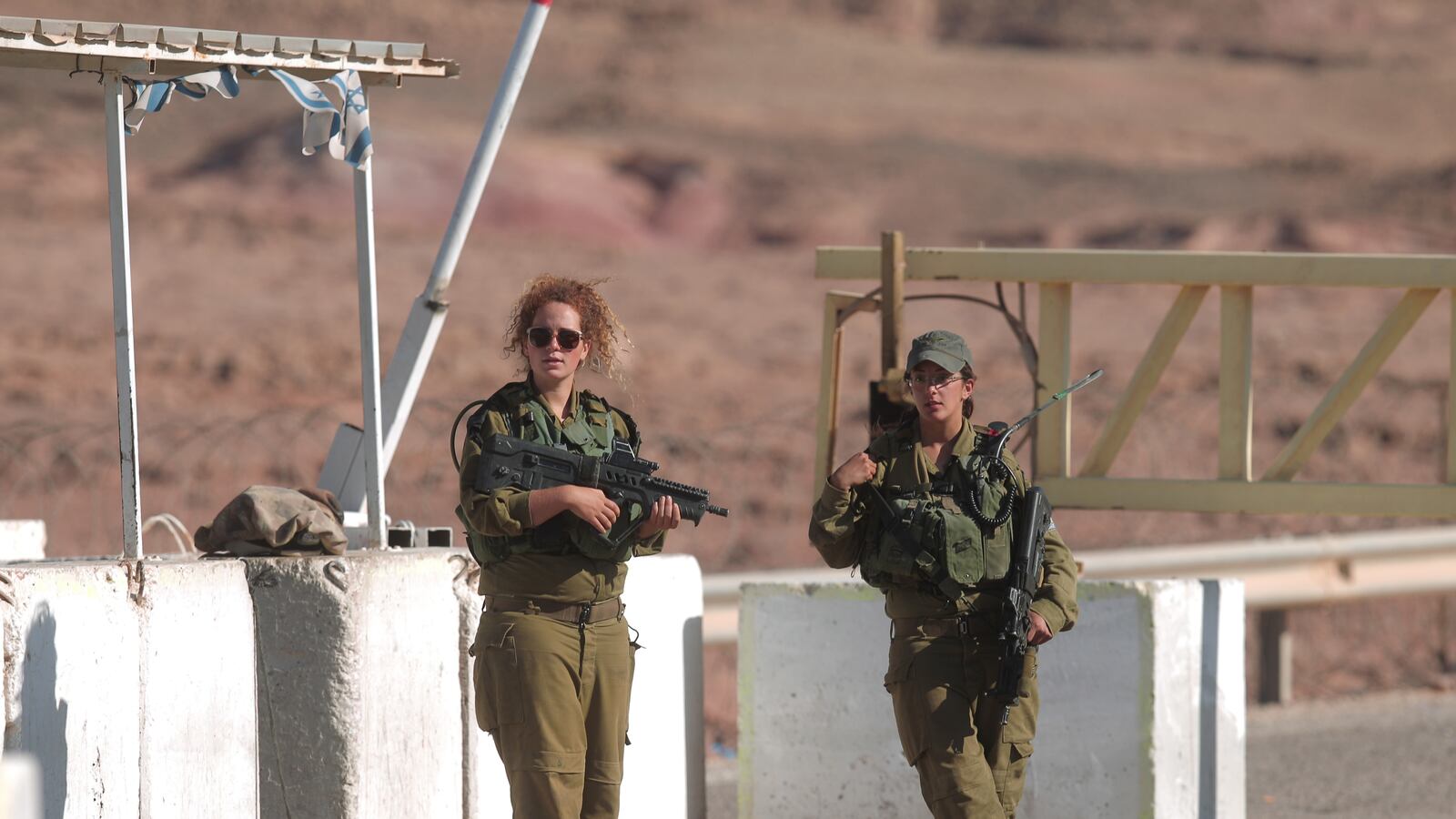 articles/2012/11/06/enough-money-too-much-occupation/female-soldiers-openz_exhq4d