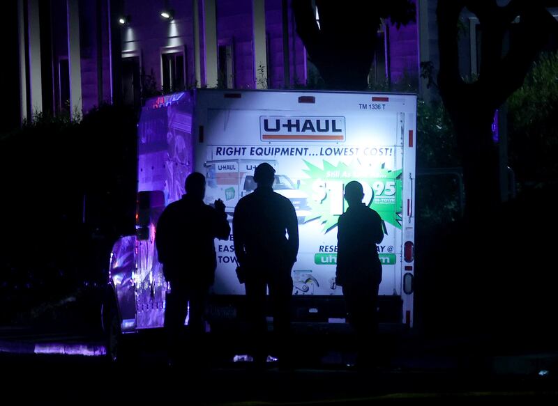 Police investigate after shots were fired near the Coast Guard Island entrance