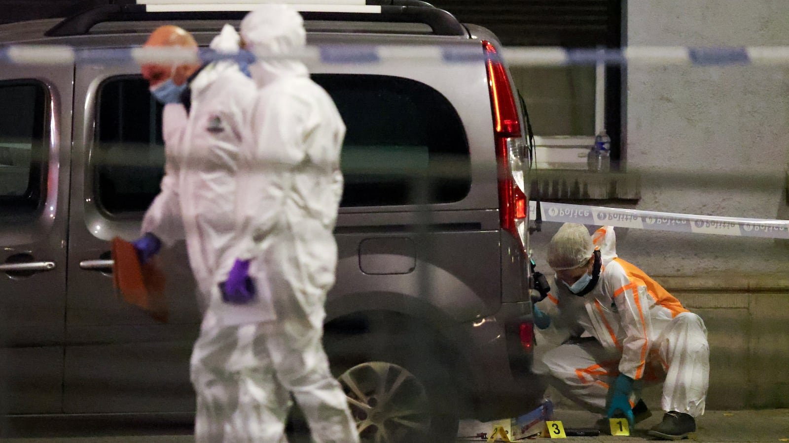 Police work a crime scene in Brussels, Belgium.