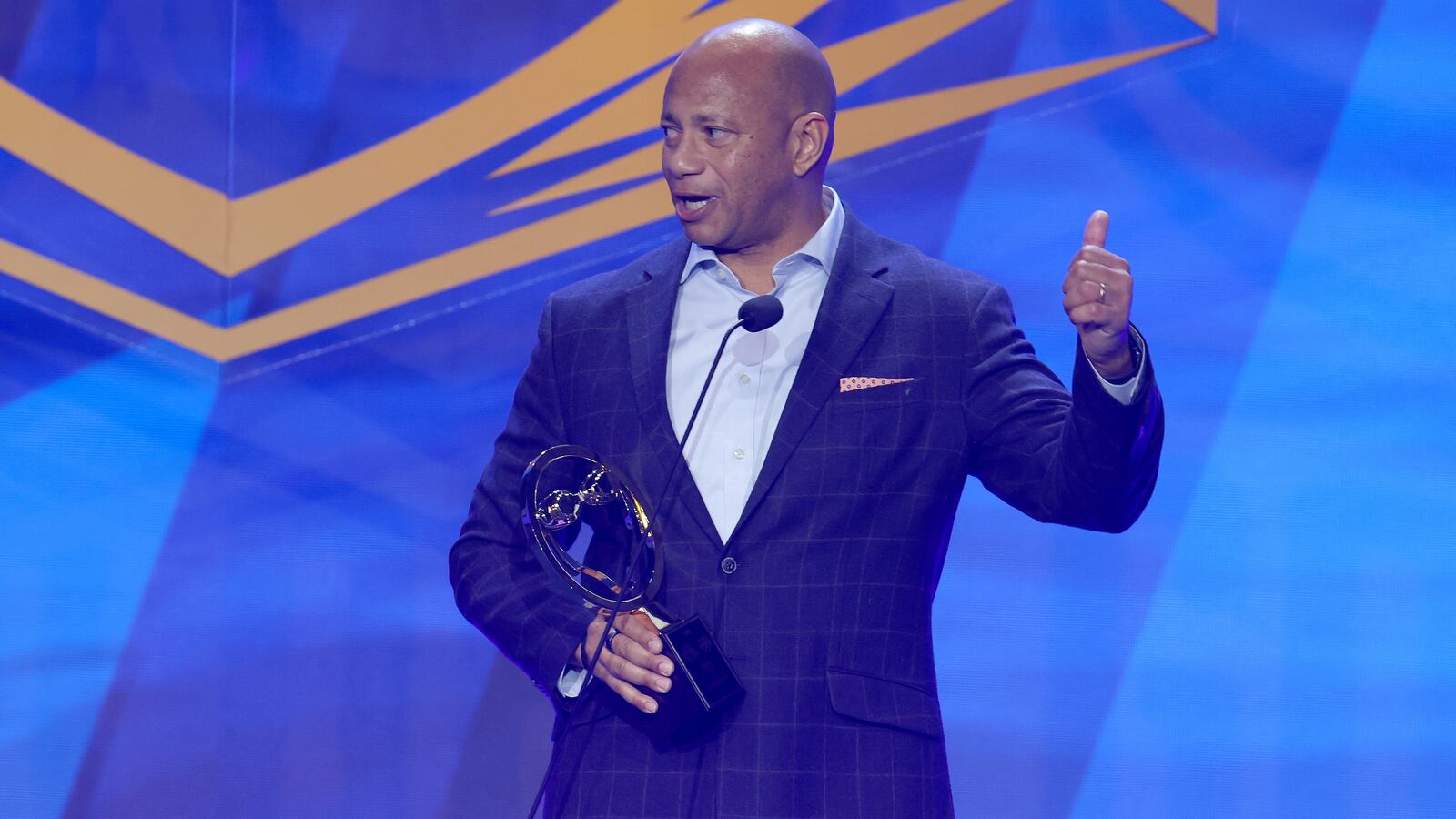 Anthony Nesty speaks after receiving the Coach of the Year award during the 2022 Golden Goggle Awards.