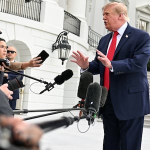 US President Donald Trump speaks to the media as he departs the White House on the South Lawn in Washington, DC, US, September 26, 2026. REUTERS/Annabelle Gordon