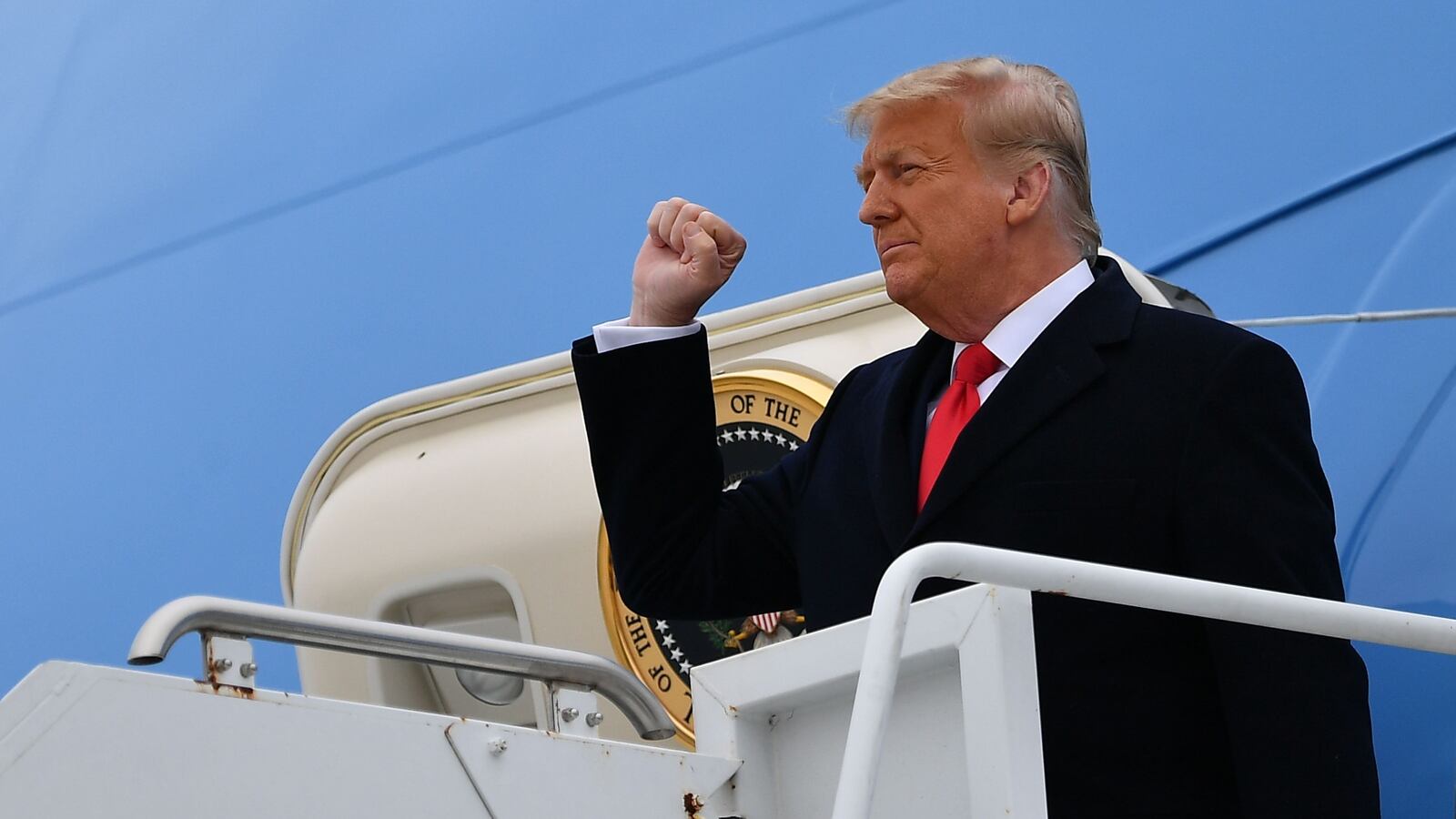 US President Donald Trump steps off Air Force One upon arrival in Harlingen, Texas, on January 12, 2021. - Trump is in Texas to review his border wall project. (Photo by MANDEL NGAN / AFP) (Photo by MANDEL NGAN/AFP via Getty Images)
