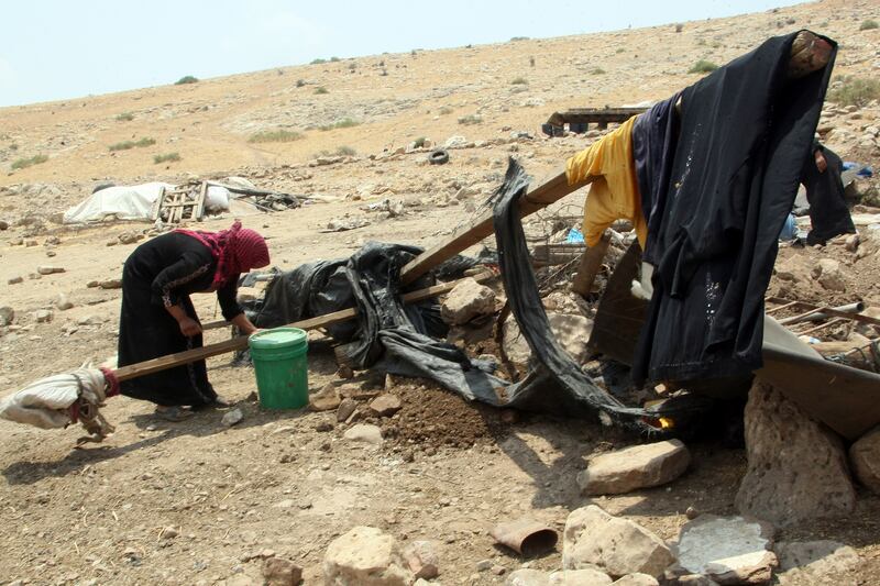 articles/2012/08/09/susya-human-rights/susya-woman-openz_hdo5qg