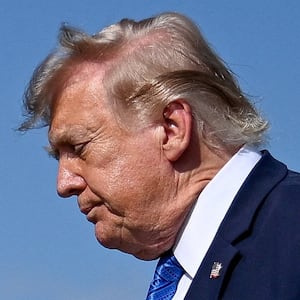 U.S. President Donald Trump gives thumbs-up as he walks to board Marine One following his arrival aboard Air Force One at Morristown Municipal Airport in Morristown, New Jersey, U.S., July 31, 2026.
