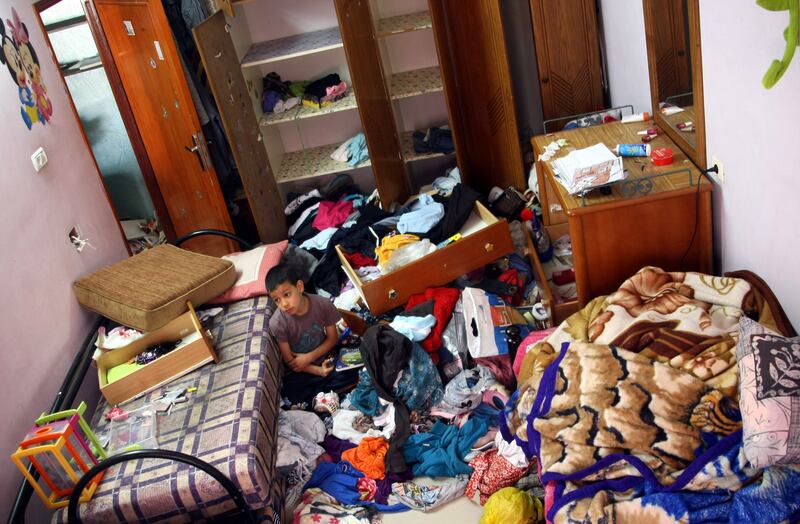 articles/2013/11/04/on-u-s-tour-breaking-the-silence-says-talking-about-the-occupation-is-no-longer-a-taboo/OZ_idf_house_search_uj5lne