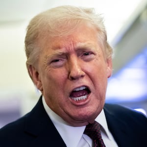 IN FLIGHT - MARCH 15: U.S. President Donald Trump speaks to members of the media onboard Air Force One on March 15, 2026 while en route to Joint Base Andrews, Maryland from West Palm Beach Florida. President Trump returned to Washington D.C. on Sunday following a weekend trip to Florida. (Photo by Nathan Howard/Getty Images)