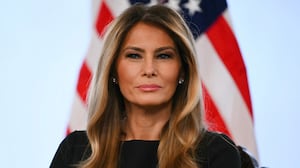 First lady Melania Trump participates in calls to US service members, on Christmas Eve, from the Mar-a-Lago club in Palm Beach, Florida, December 24, 2025. (Photo by ANDREW CABALLERO-REYNOLDS / AFP via Getty Images)