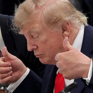 U.S. President Donald Trump gestures during a working session with G7 leaders and outreach partners on international investment partnerships at the G7 summit in Evian-les-Bains, France, June 16, 2026.  REUTERS/Christian Hartmann