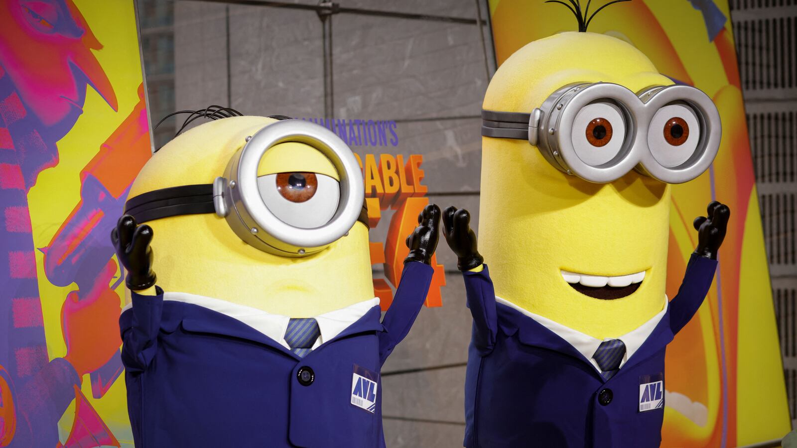 Two minions posing on the red carpet at the premiere of "Despicable Me 4."