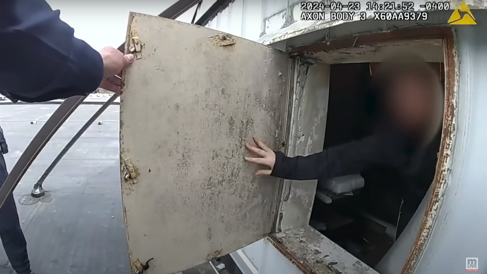 Moment cops bust woman living in store sign