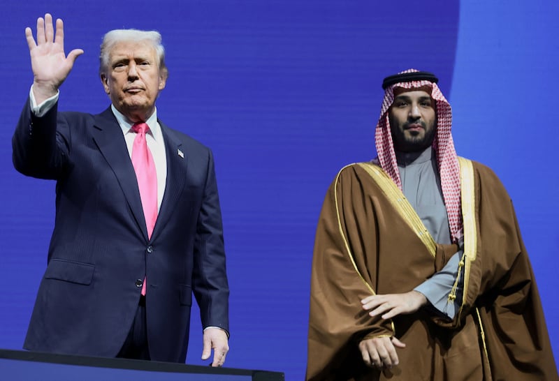 U.S. President Donald Trump and Crown Prince and Prime Minister Mohammed bin Salman of Saudi Arabia attend the U.S.-Saudi Investment Forum in Washington, D.C., U.S., November 19, 2025.