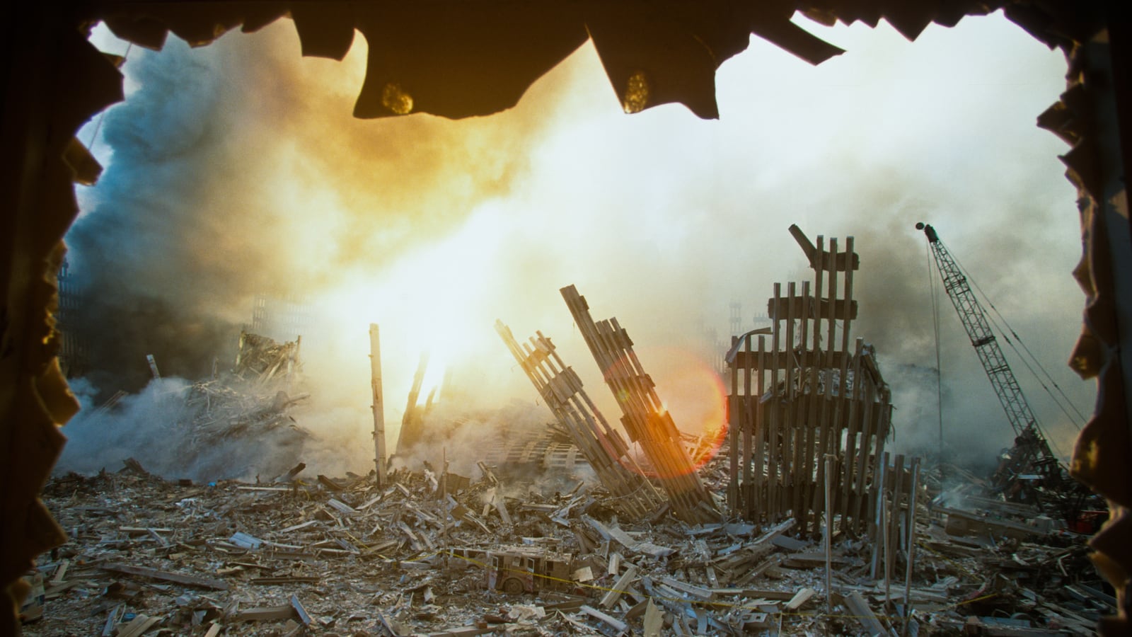 The rubble of the World Trade Center smolders following a terrorist attack September 11, 2001 in New York.