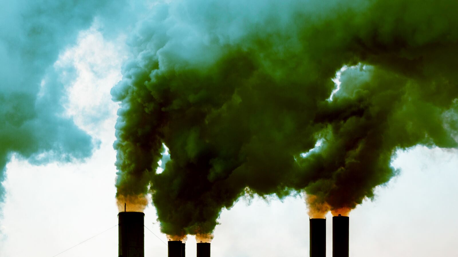 image of plumes of smoke coming out of factory carbon dioxide emissions pollution co2 trump gina loudon fake psychologist psychology phd envirowhacked environment