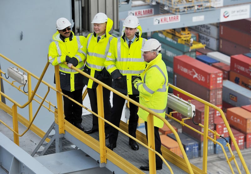 Prince William, Duke of Cambridge (second right) stands on a gantry atop one of the ship container cranes, with DP World chairman Sultan Ahmed Bin Sulayem (left), William Hague (second left) and DP World CEO Simon Moore during a visit to DP World London Gateway on March 14, 2016 in Stanford-le-Hope, in Essex.