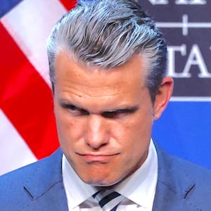 U.S. Defense Secretary Pete Hegseth looks on as U.S. President Donald Trump speaks to the media at the end of his participation in the NATO leaders summit in Ankara, Turkey, July 8, 2026.