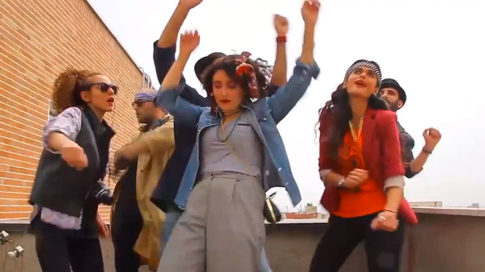 articles/2014/05/21/happy-dancers-arrested-abused-in-iran/140521-iran-happy-video-tease_kuyksc