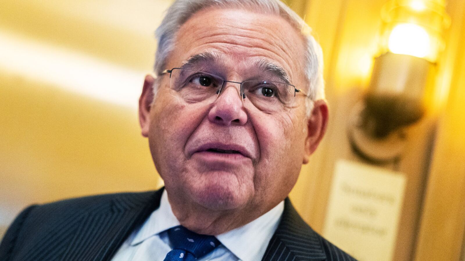 A photo including Senator Bob Menendez