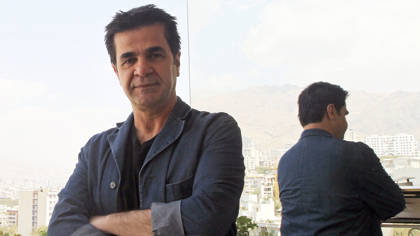 articles/2014/07/08/jafar-panahi-filmmaking-ban-is-my-iranian-prison/140707-iran-filmmaker-akrami-tease_y5zv3o