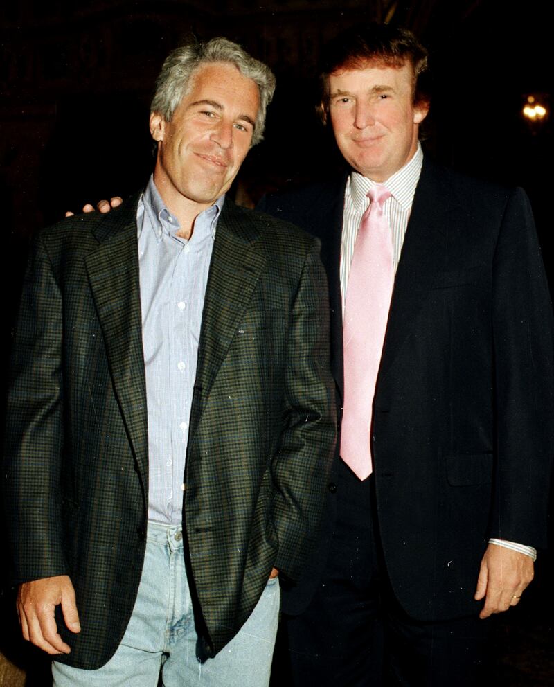 Portrait of American financier Jeffrey Epstein (left) and real estate developer Donald Trump as they pose together at the Mar-a-Lago estate, Palm Beach, Florida, 1997.(Photo by Davidoff Studios/Getty Images)