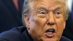 President Donald Trump had a noticeably scratchy voice while speaking in the Oval Office on November 17, 2025, but he said he got it yelling about trade.