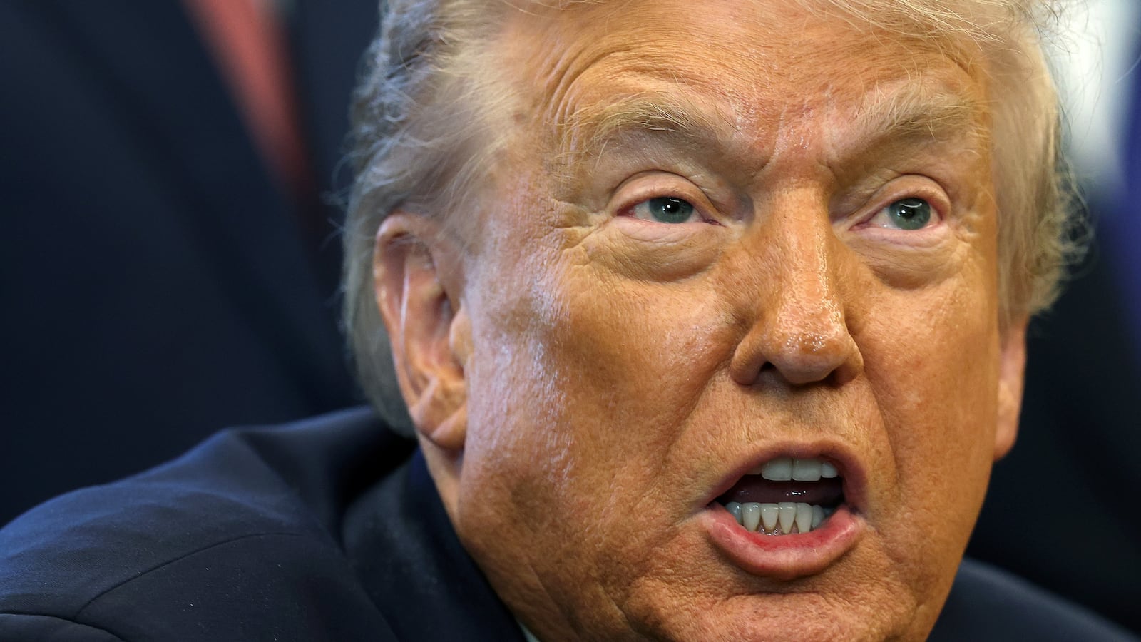 President Donald Trump had a noticeably scratchy voice while speaking in the Oval Office on November 17, 2025, but he said he got it yelling about trade.