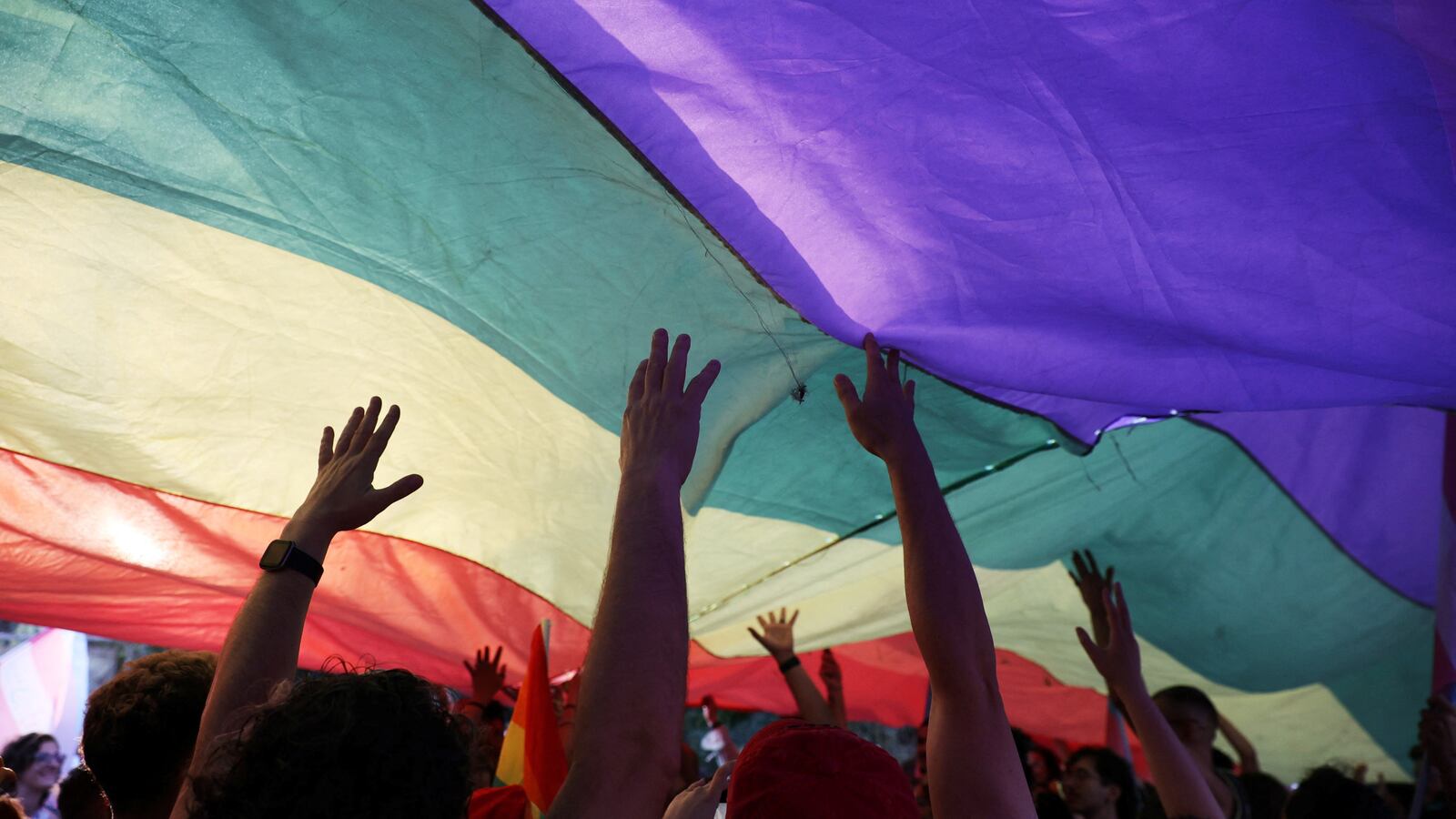 "Members of Cyprus's LGBTQ+ communities from both sides attend the annual bi-communal LGBTQ+ Pride at Ledra Palace inside the UN buffer zone in Nicosia, Cyprus.
