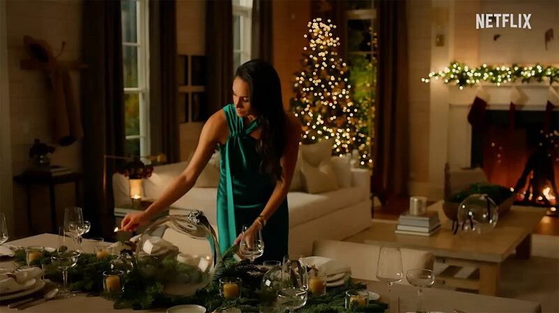 Meghan Markle is pictured setting a table in a screenshot from her forthcoming Netflix special.