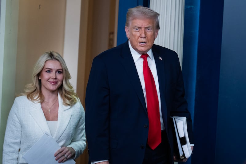 UNITED STATES - JANUARY 20: President Donald Trump arrives to speak to the media in the White House briefing room about the administration's accomplishments on the anniversary of his first year of his second term in office, on Tuesday, January 20, 2026. Karoline Leavitt, White House press secretary, appears at left.